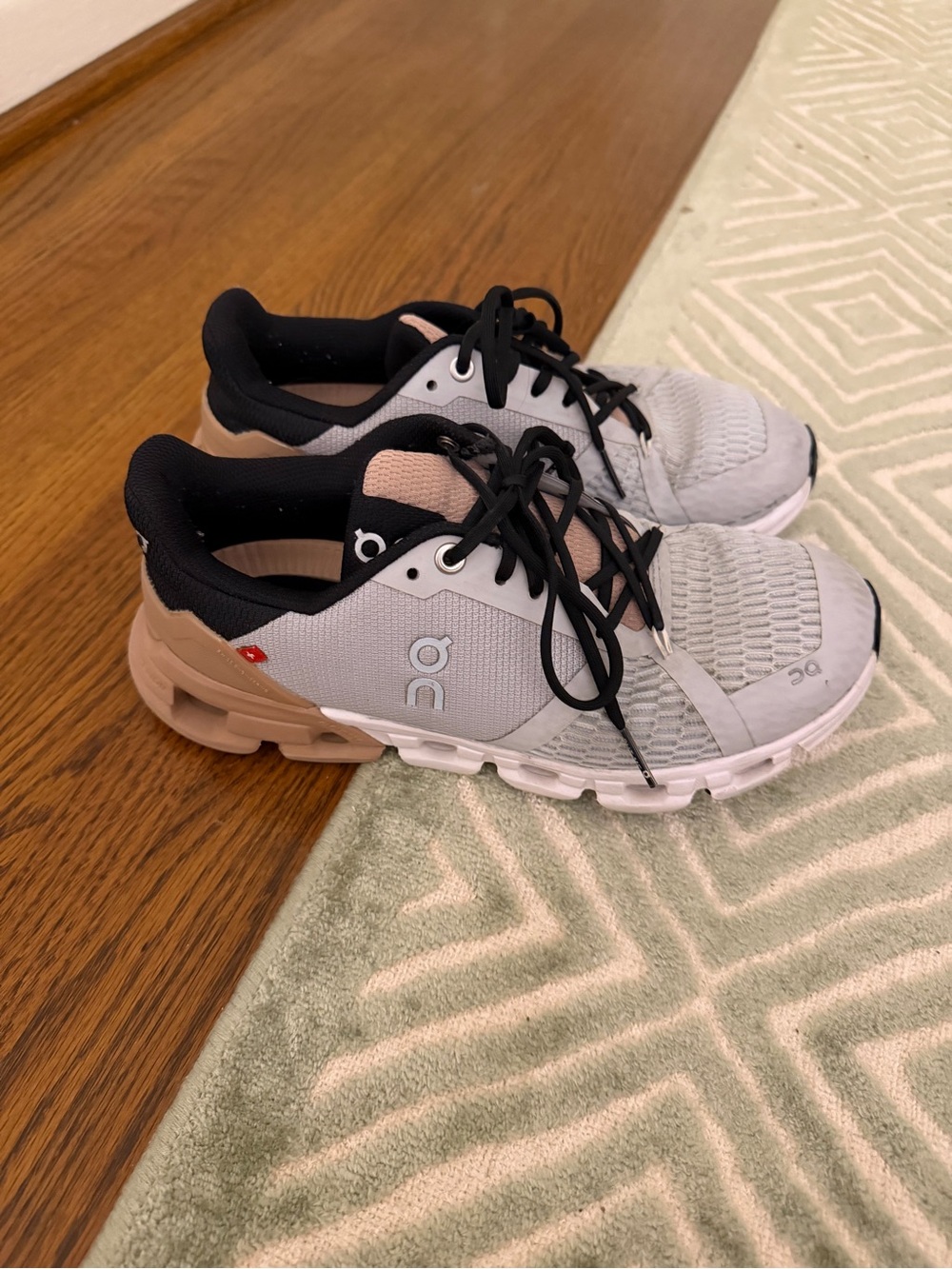 On Running Women’s Cloudrunner Sneakers in Light Gray and Beige